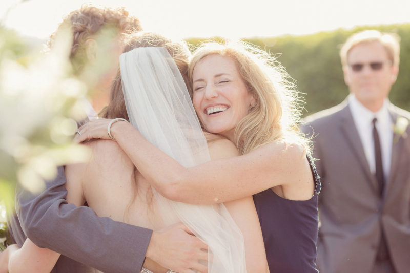 mothers embrace after the ceremony at Palos Verdes Golf Course